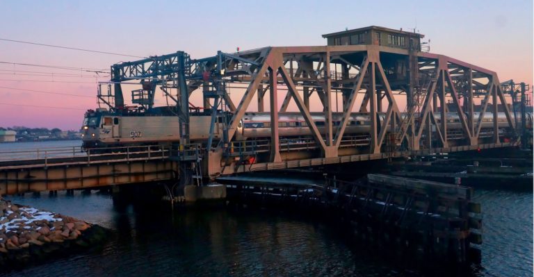 Shaw's Cove Swing Bridge - Fabricate and machine 8 sets of spring activated Mitre Lift brackets for the ends of the bridge rails; this includes the manufacturing of new shafts, couplings, support pedestals, gear reducers and drives.  All items were assembled, aligned and tested prior to shipping.  August 2001 Amtrak